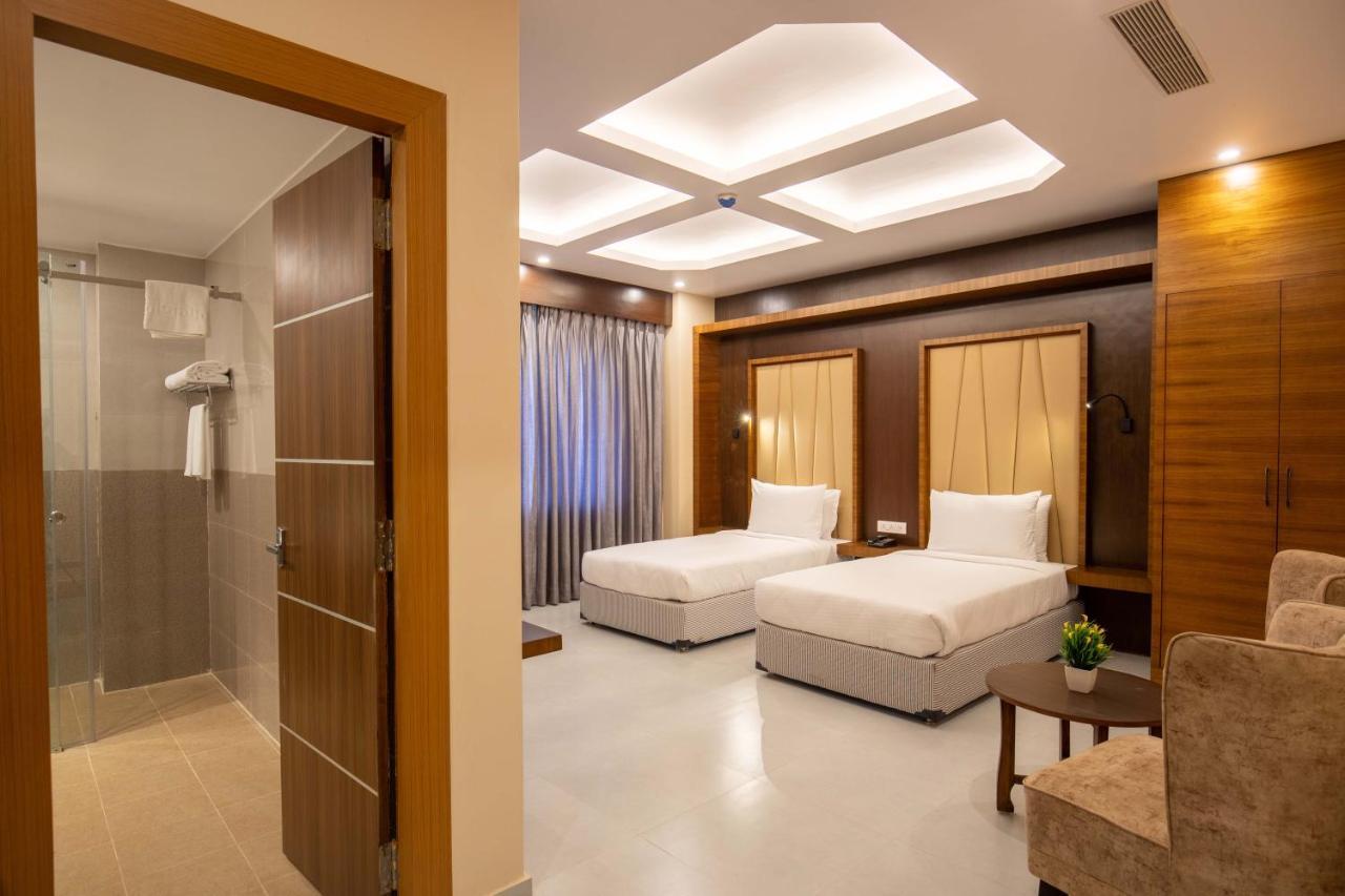 Butwāl Hotel Palm International מראה חיצוני תמונה