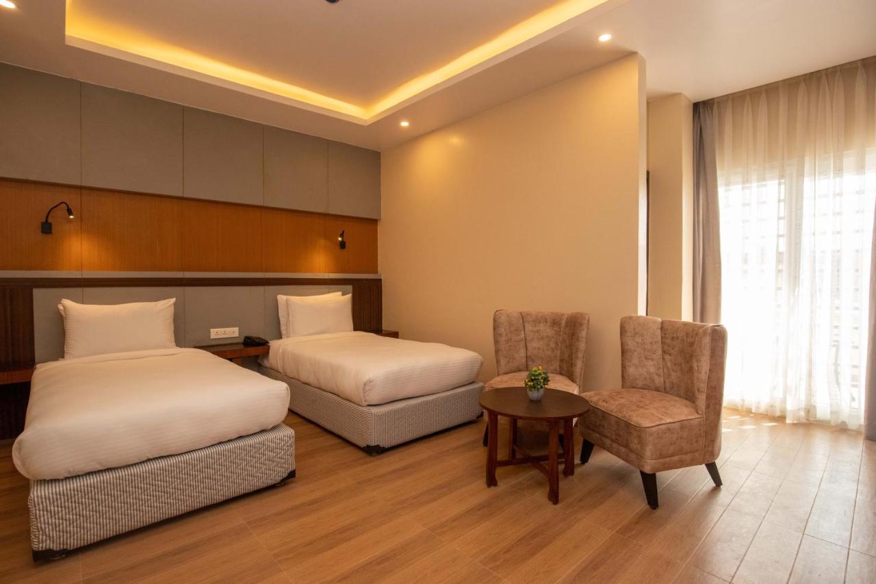 Butwāl Hotel Palm International מראה חיצוני תמונה